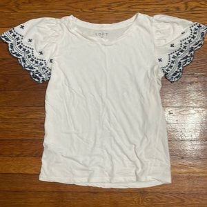 Embroidered flutter sleeve top